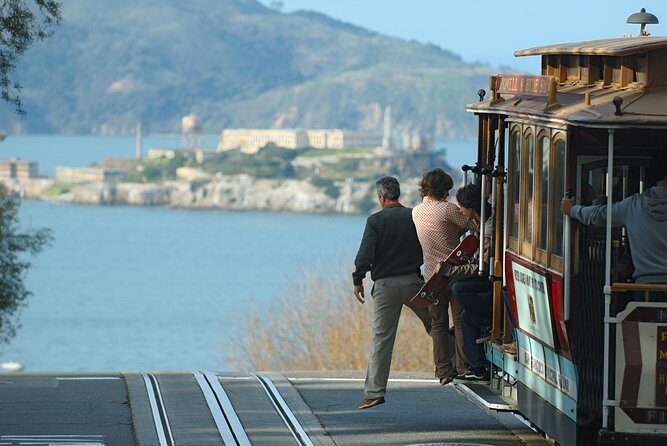 Mix & Save: San Francisco Grand City Tour + Escape from the Rock Cruise - Mission District Photo Stop and Fisherman’s Wharf Landing at Pier 39